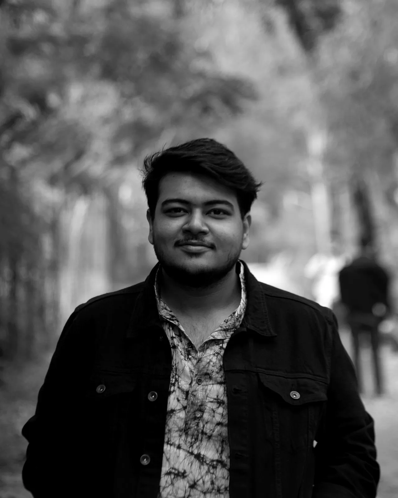 Praduan Saha on a tree-lined path in Kolkata